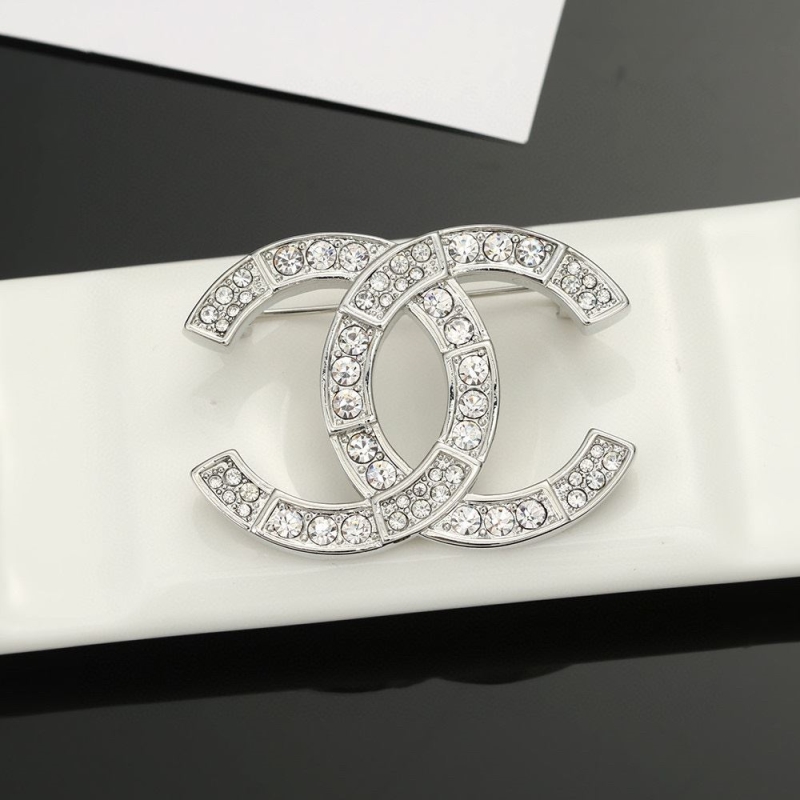 Ch**el brooches